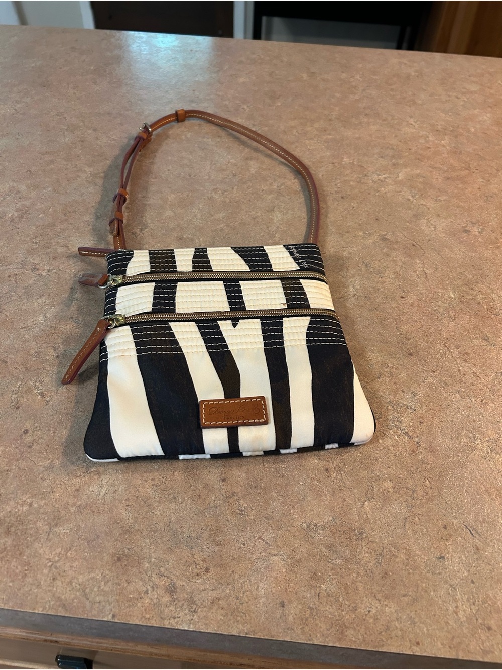 Striped Black and White Dooney Crossbody Wristlet with Tan Accents